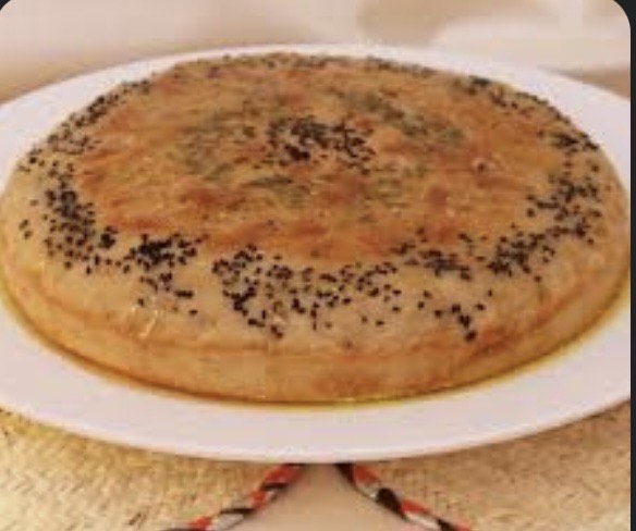 الخبزه الجنوبيه فيه منها بر وفيه دقيق ابيض