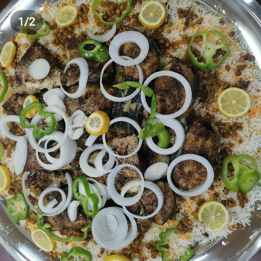 رز ابيضبالحشو مع سمك مقلي