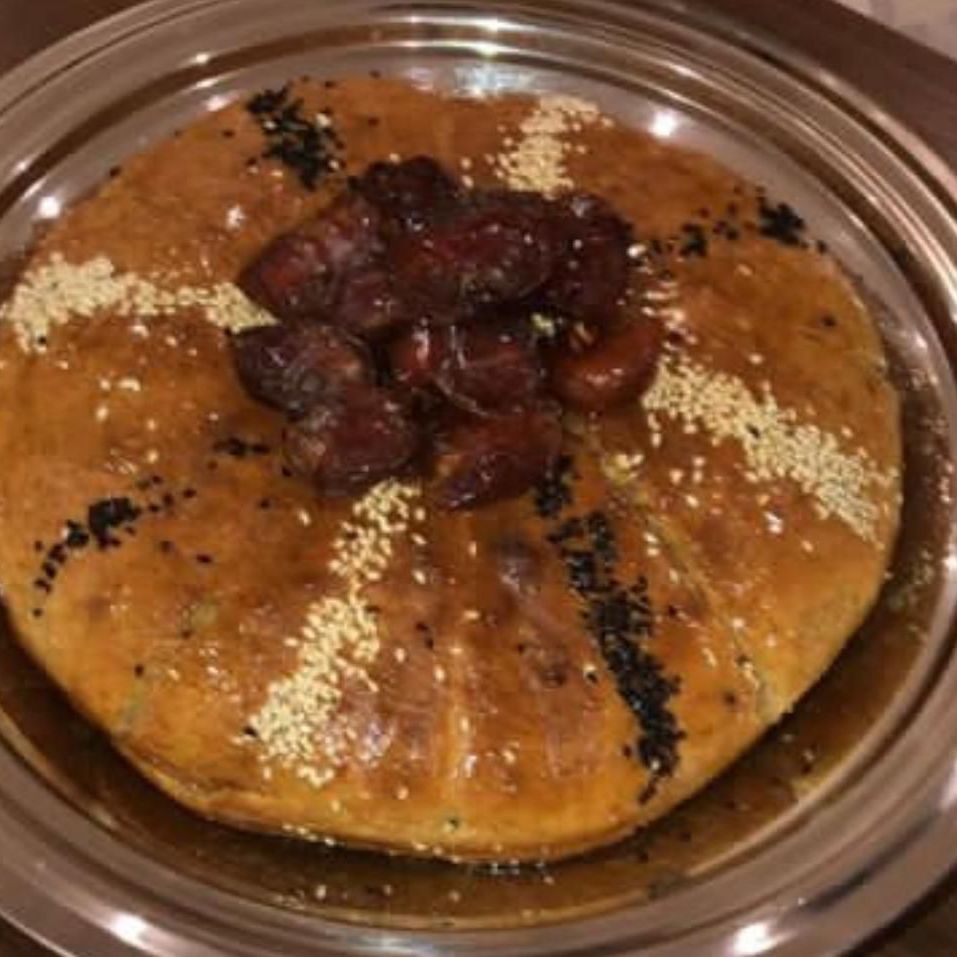 خبزه ماله مع السمن والعسل والحبه السوداء والسمسم تكفي 8 أشخاص وكثر