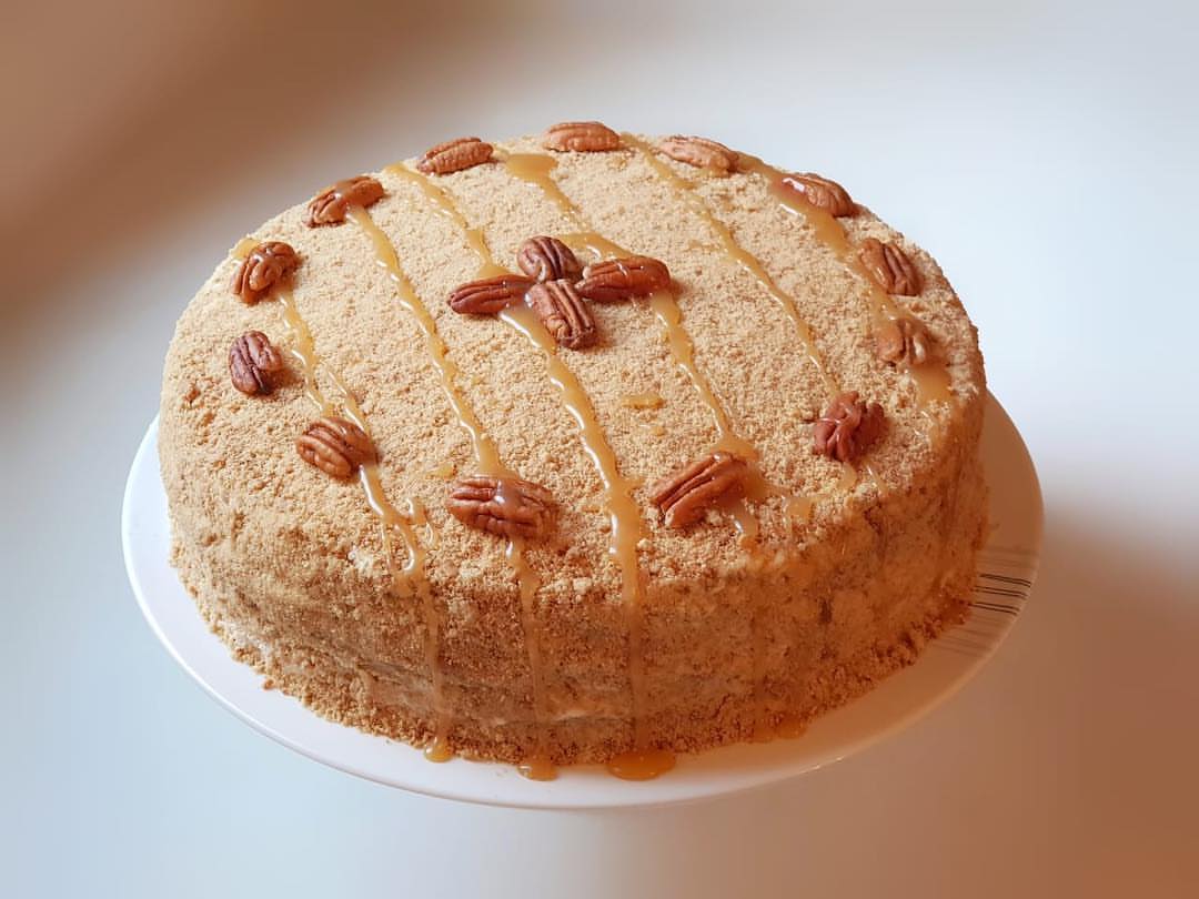 Flavorful Russian Honey Cake!! Available with caramel sauce or creme cheese topping كيكة ا