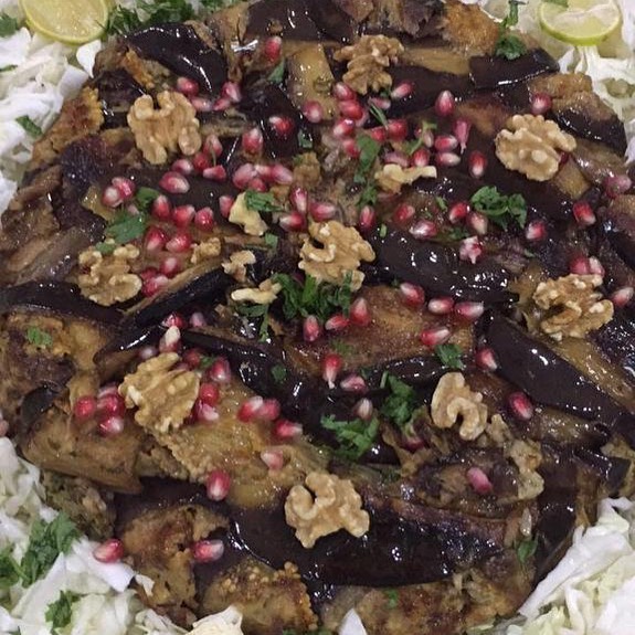 دولمه الباذنجان بالليمون ودبس الرمان