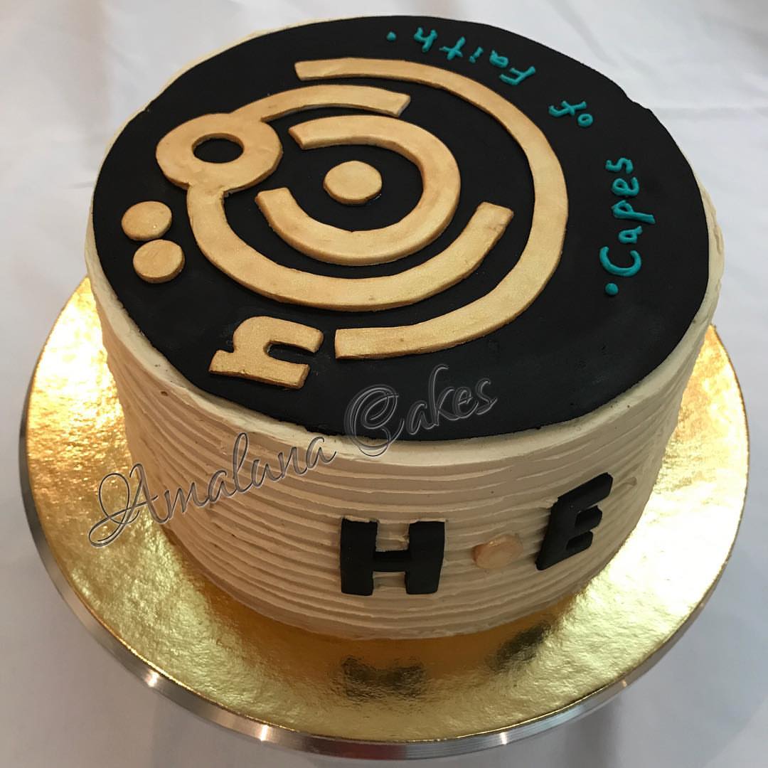 Capes of Faith Logo Cake! This was a moist chocolate cake and roasted hazelnut frosting wi