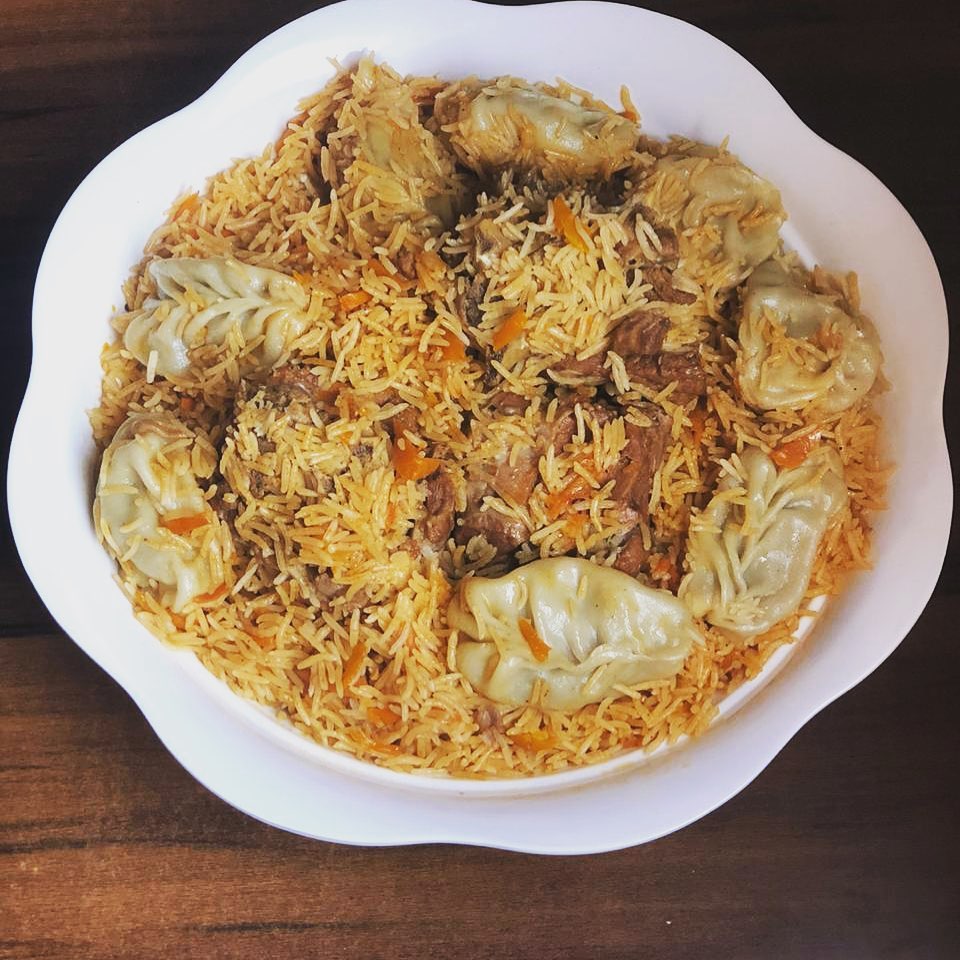 رز بخاري باللحم مع منتو