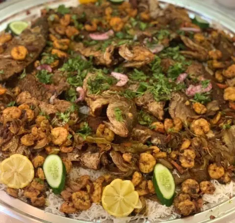 سمك وربيان مع رز