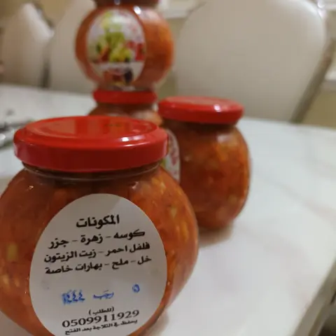 دقوس بالخضار زهرة كوسه جزر ثوم فلفل احمر حار بهارات خاصة زيت الزيتون وخل مع الكبسة شي ثاني