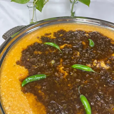 جريش احمر باللحم او الدجاج