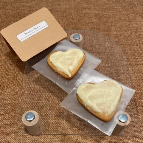 peanut heart for all the peanut butter lovers we present to you a peanut butter cookie glazed with vanilla