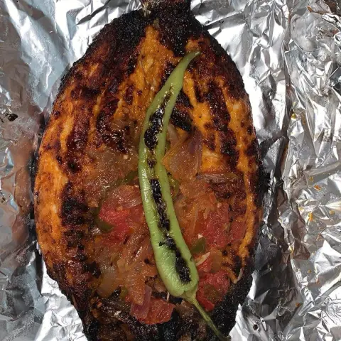 سمك طازج في الفرن مع اضافه رز او بدون
