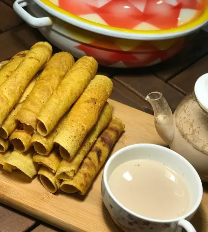 مراهيف مع كوب من الحليب مع القرفه الذ فطور
